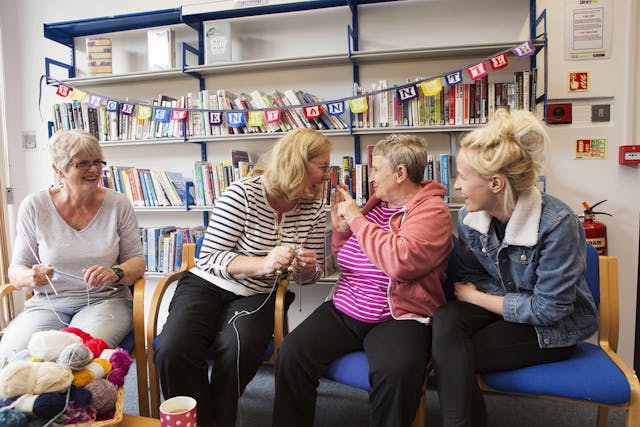 Extract from JohnsonBanks’ Newsletter:  A UK-wide photo-shoot by renowned reportage photographer Nancy Honey is another key element of the new brand. From tea-dances to pottery lessons, table football to tea and biscuits, the young and old are all portrayed as equally - and as positively - as possible.